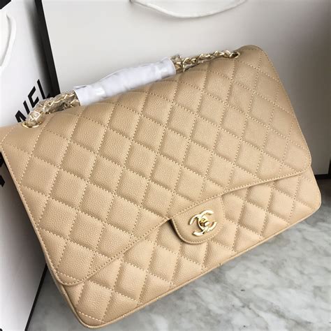 beige chanel maxi caviar handbag|CHANEL.